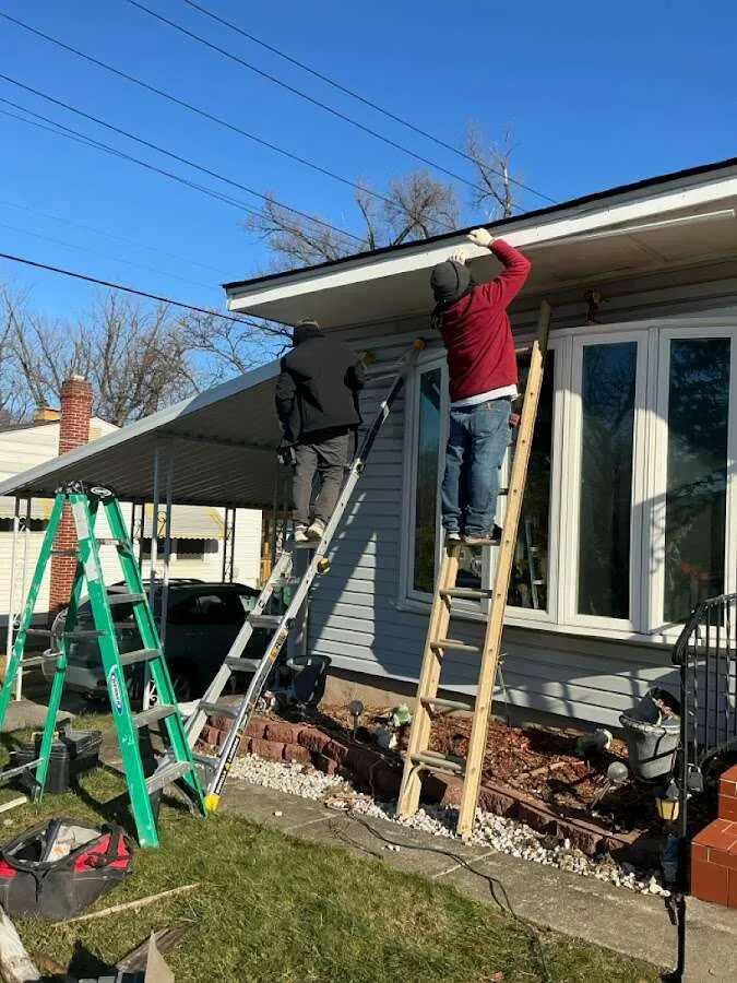 Restoration crew performing exterior repair in Crowley
