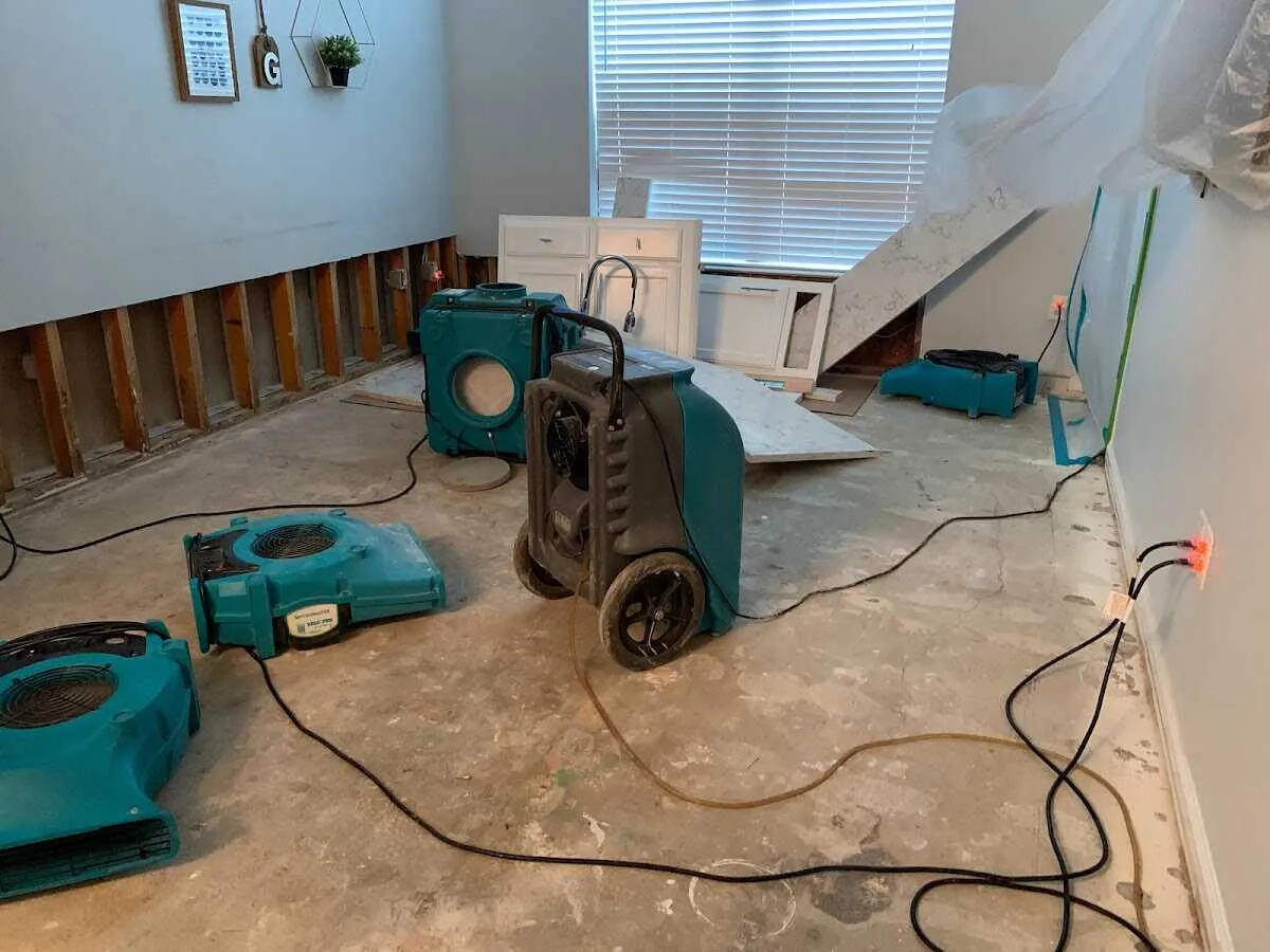 Dehumidifier in flood-cut room for Water Damage Restoration in Crowley
